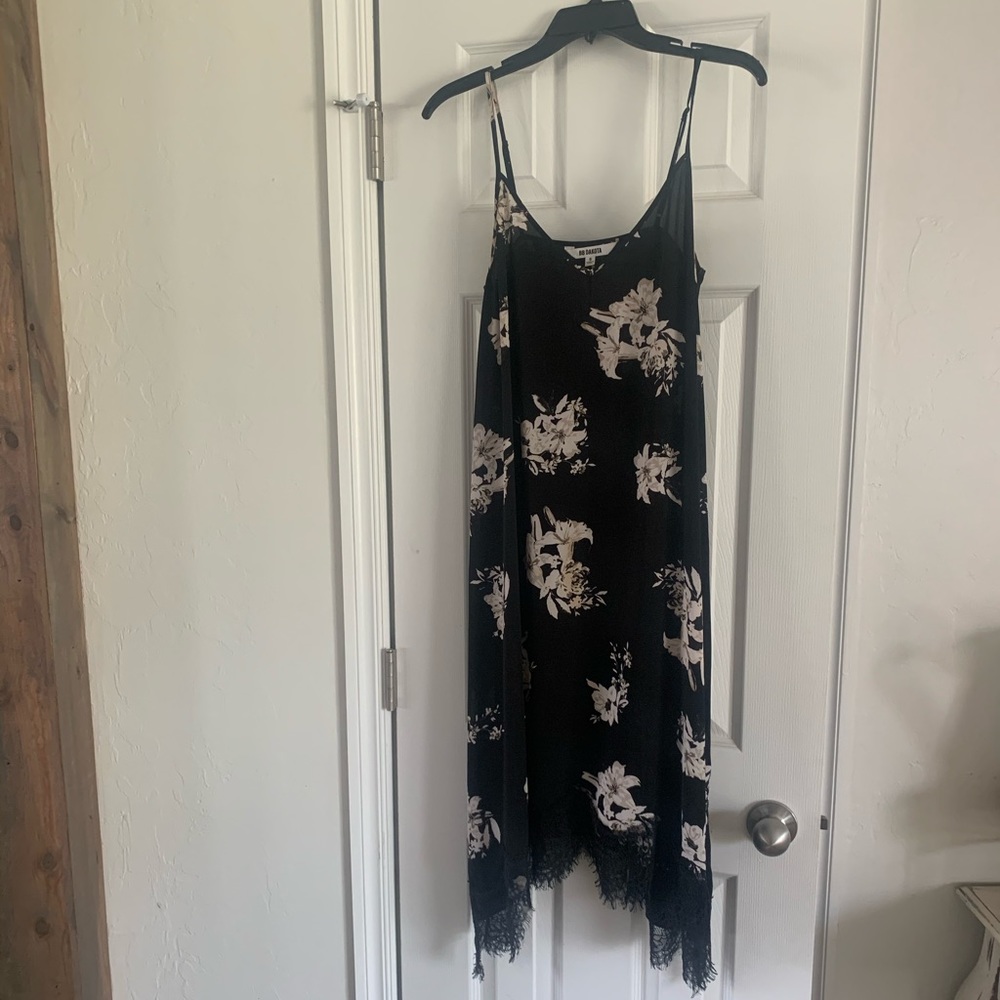 Black spaghetti strap dress with with lily print